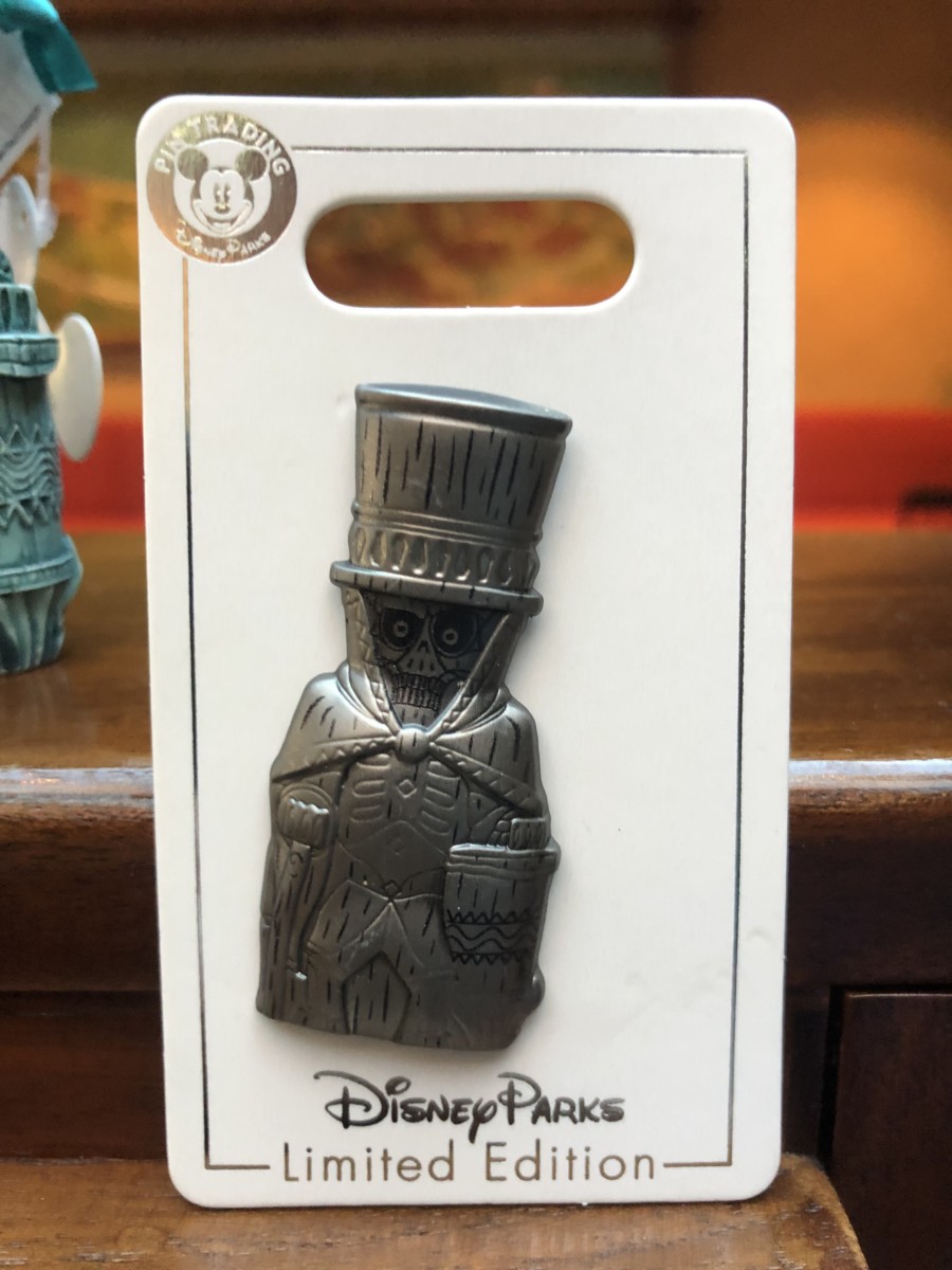 PHOTOS New Hatbox Ghost Tiki Ornament and Limited Edition Pin Arrive at Disney's Polynesian