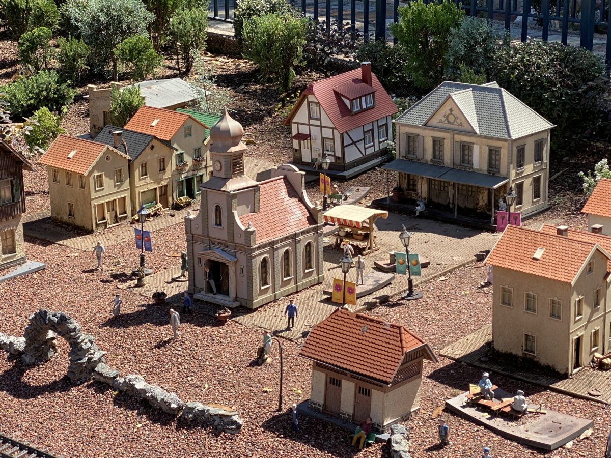 PHOTO REPORT: EPCOT 3/3/21 (First Day of Taste of EPCOT International Flower & Garden Festival, Flags Arrive at Park Entrance, Eats At EPCOT Experience Closed, and More) 24 germany-pavilion-model-train-village-tiny-town-flower-and-garden-banners-epcot-03032021-1459049