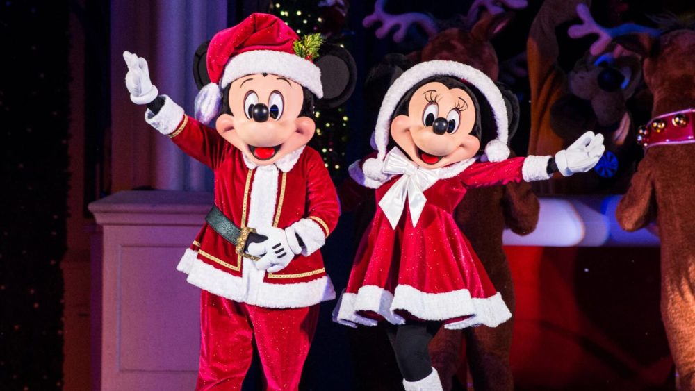Mickey and Minnie in Santa outfits, Mickey’s Most Merriest Celebration