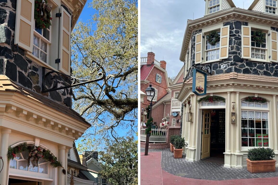 Historic building with stone facade, decorative windows, and holiday wreaths resembling Ye Olde Christmas Shoppe charm. An entrance sign welcomes visitors near a large adjacent tree and lamp post beneath the clear blue sky, creating an enchanting scene reminiscent of Magic Kingdom.