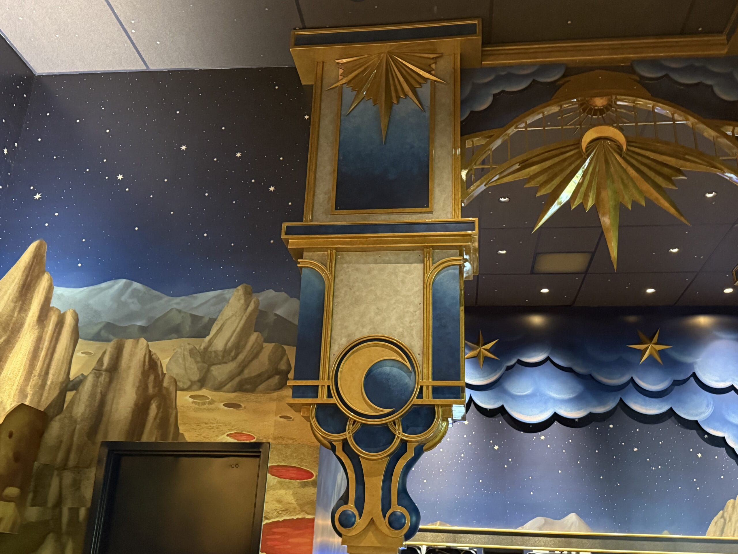 Wall art inspired by Celestial Park, with a starry sky, ornate gold pillar, and Epic Universe cosmic landscape.