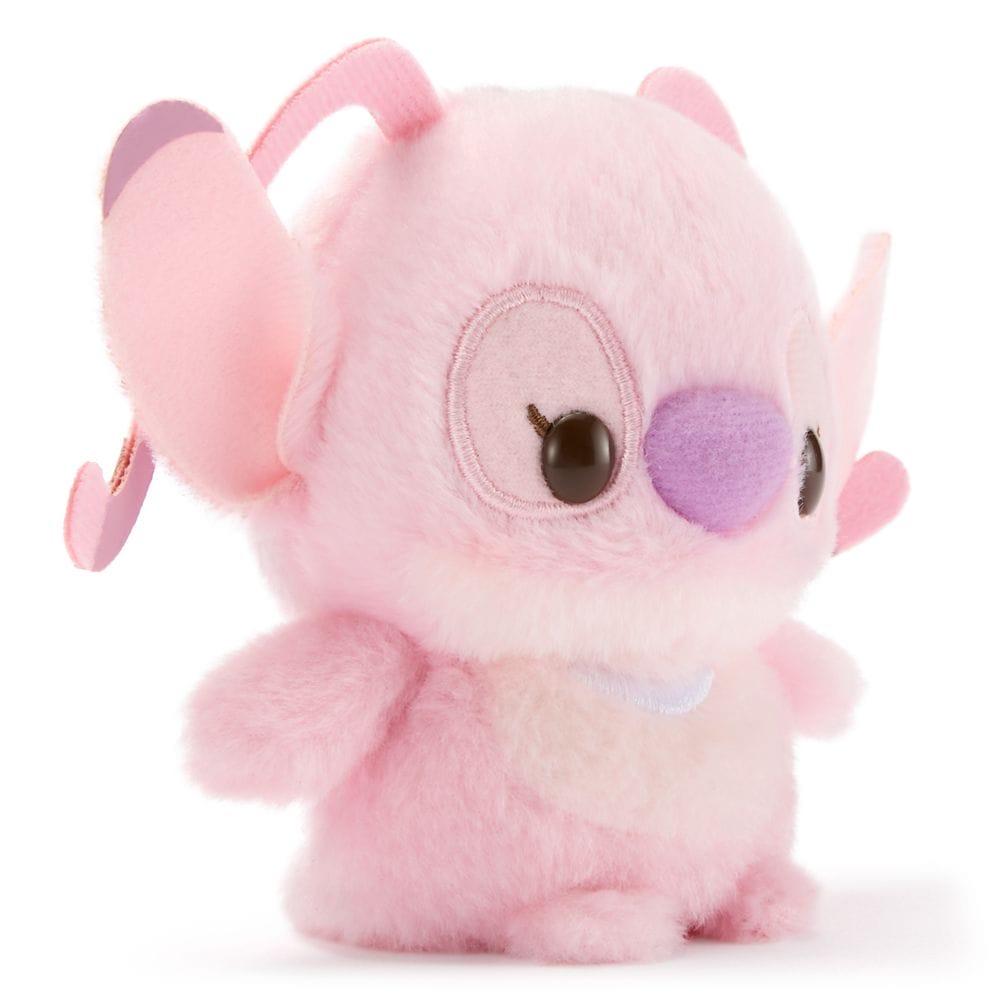 A plush toy of Angel from "Lilo & Stitch," available at Disney Store Japan, with soft pink fur and big black eyes.
