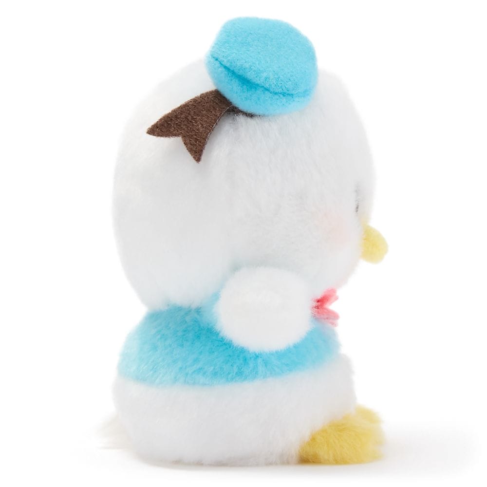 Side view of a plush Donald Duck toy from Disney Store Japan, wearing a blue hat and shirt with a red bowtie.