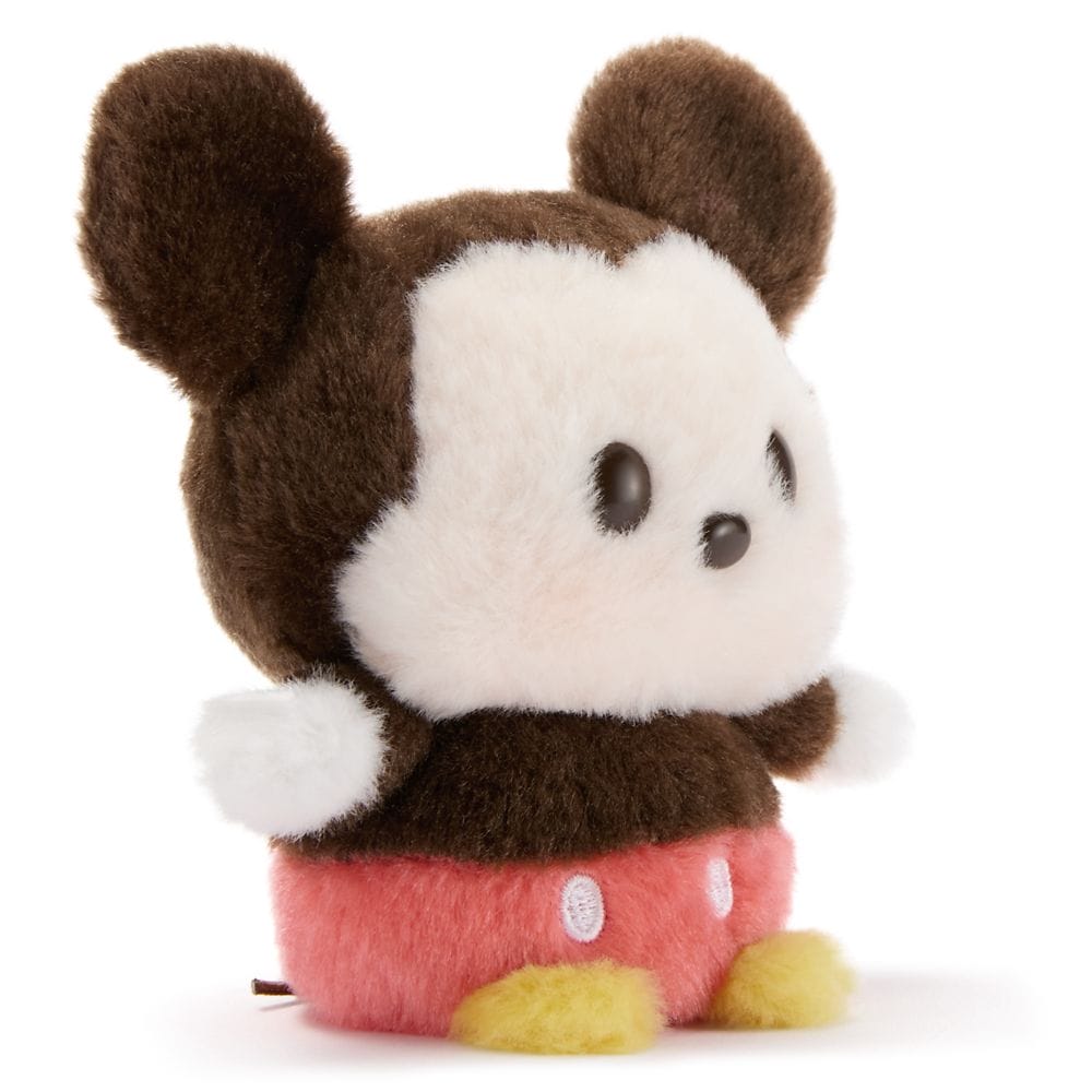 A Urupocha-Chan Plush toy resembling a cartoon mouse with brown ears, pink shorts, yellow feet, and white face and hands.