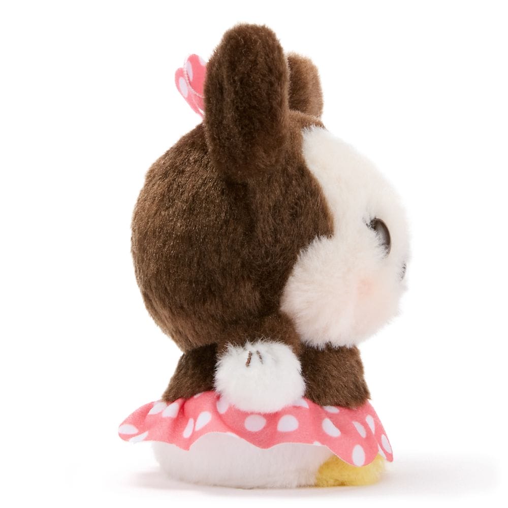 Urupocha-Chan Plush bunny with brown fur, white face, and pink polka-dot skirt, facing left on white background.