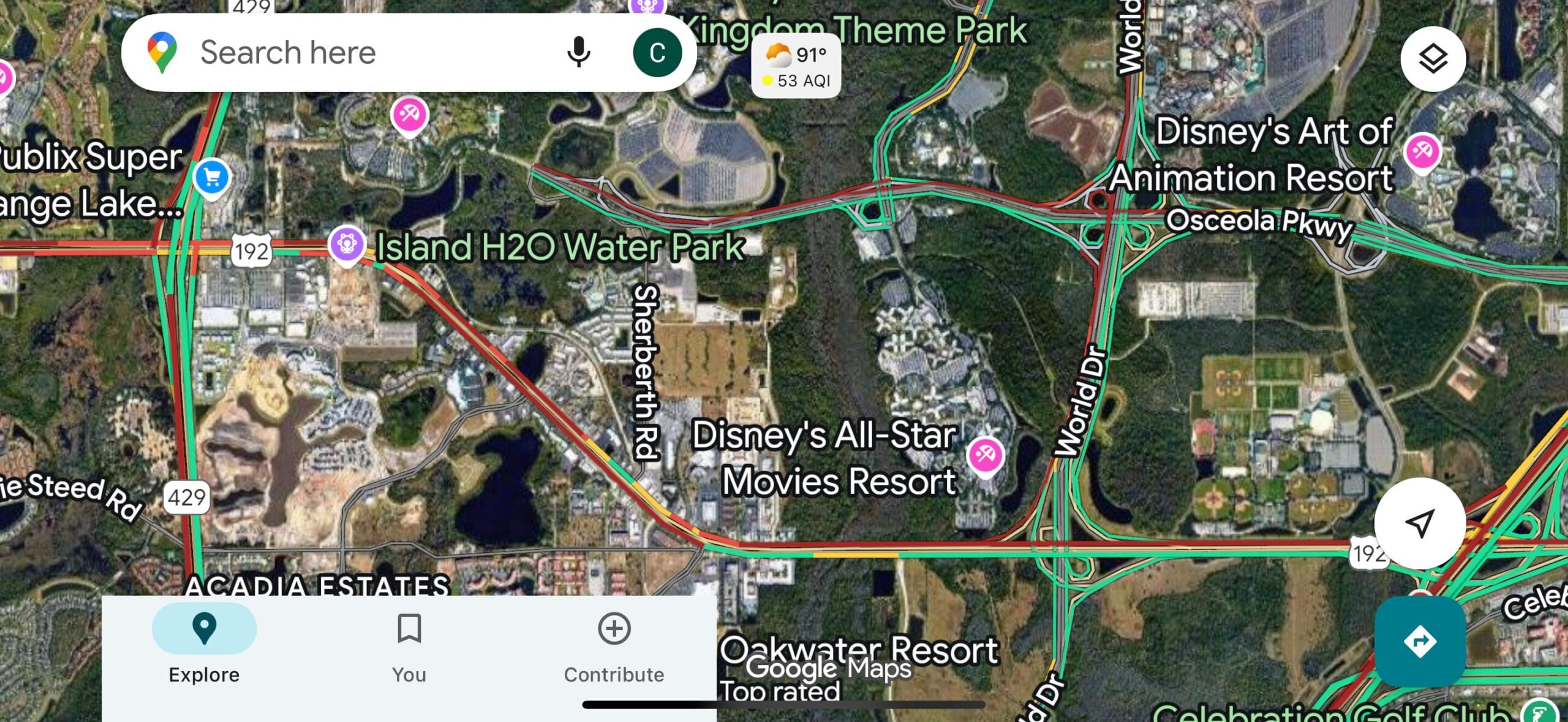 Satellite map view showing Disney resorts, Island H2O Water Park, and Walt Disney World traffic near Orlando, Florida.