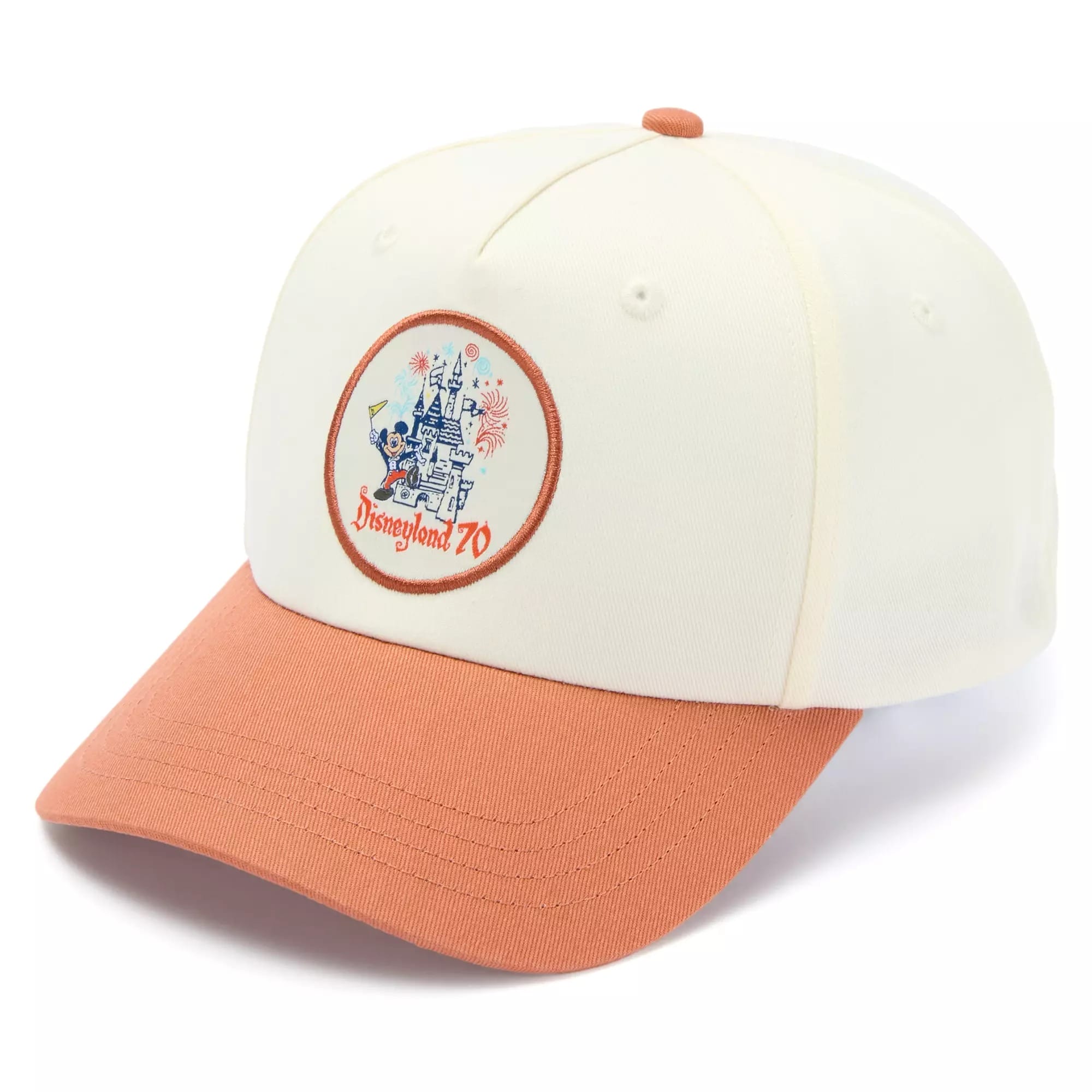 White and orange Disneyland 70th anniversary cap with a castle and Mickey Mouse patch on the front.