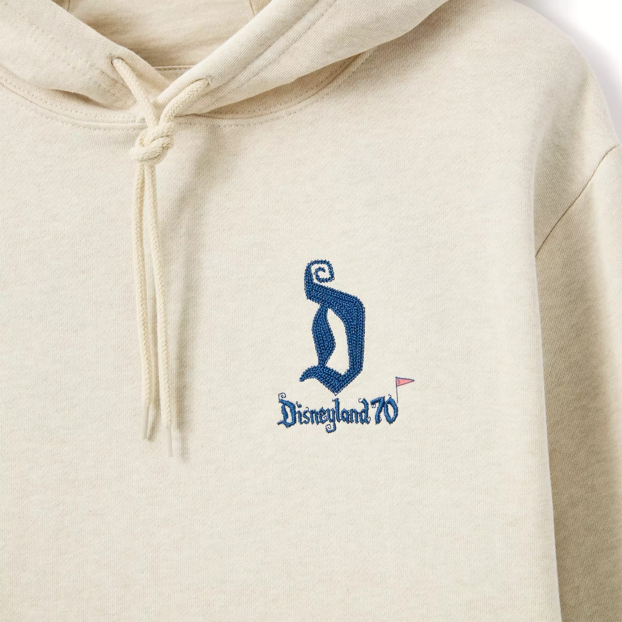 Beige hoodie with drawstring, "Disneyland 70" embroidered in blue, part of the Maps Collection.