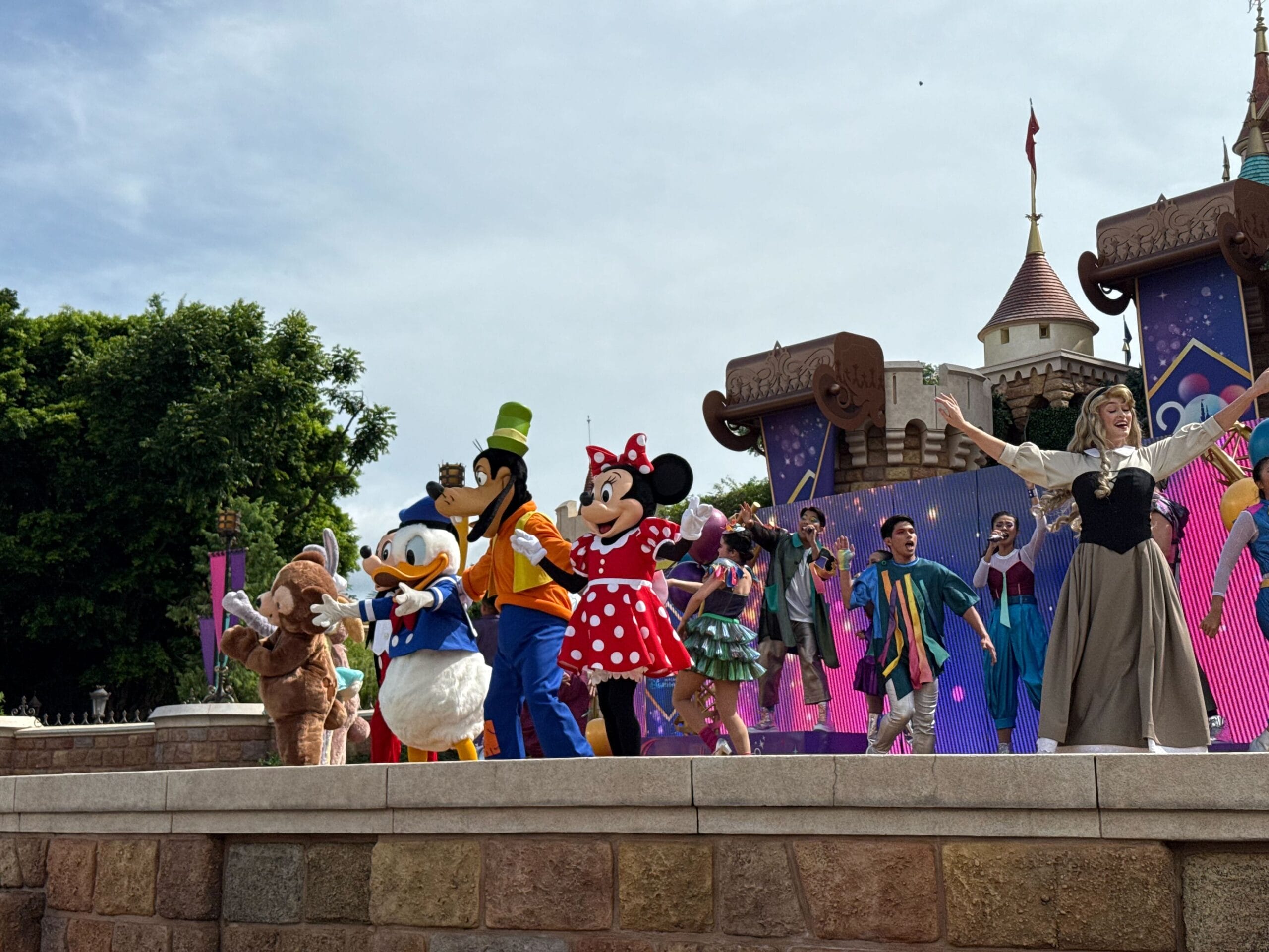 Disney Friends Live: Goofy, Donald, Minnie, and more dance on stage at Hong Kong Disneyland’s 20th Anniversary.