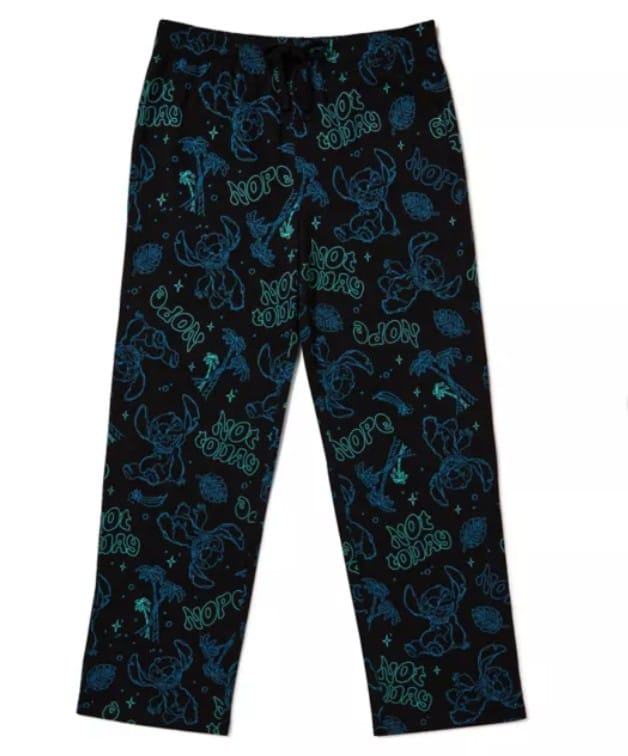 Black pajama pants from our Lilo & Stitch apparel, featuring blue and green Stitch, palm trees, and "NOPE" print.