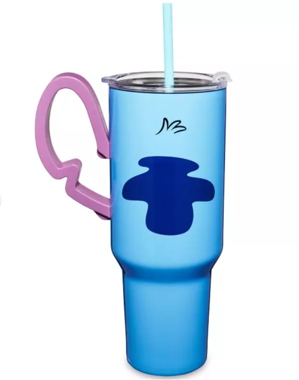 Blue travel tumbler from the new collection with a pink handle, blue straw, and dark blue abstract design on the side.
