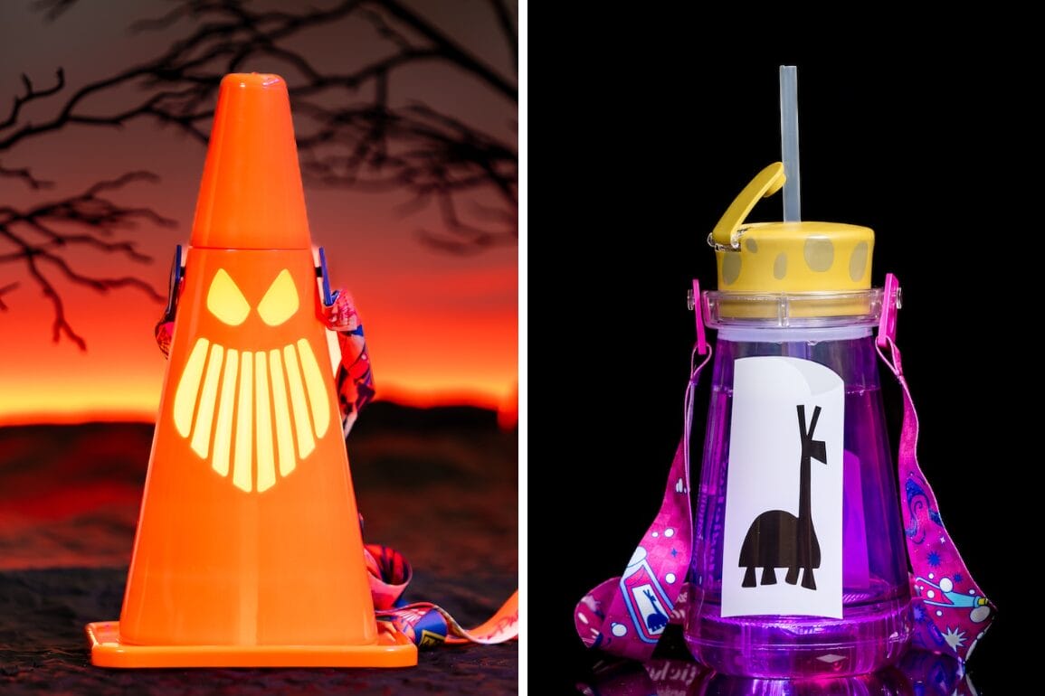 An orange traffic cone with a spooky face and a purple water bottle with a giraffe design, both with colorful straps.
