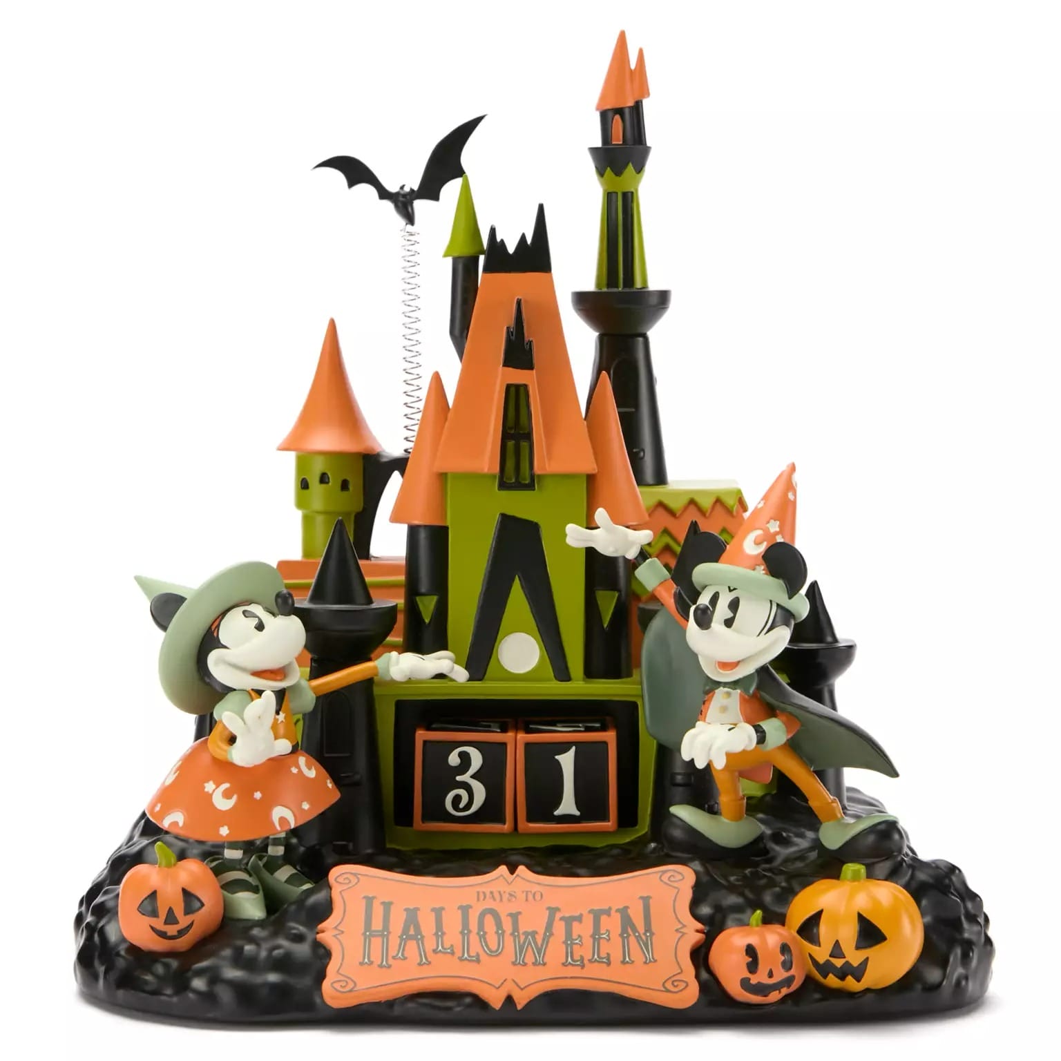 Mickey and Minnie in Halloween costumes by a spooky castle, pumpkins, and a Disney Store Halloween countdown: 31 days left!