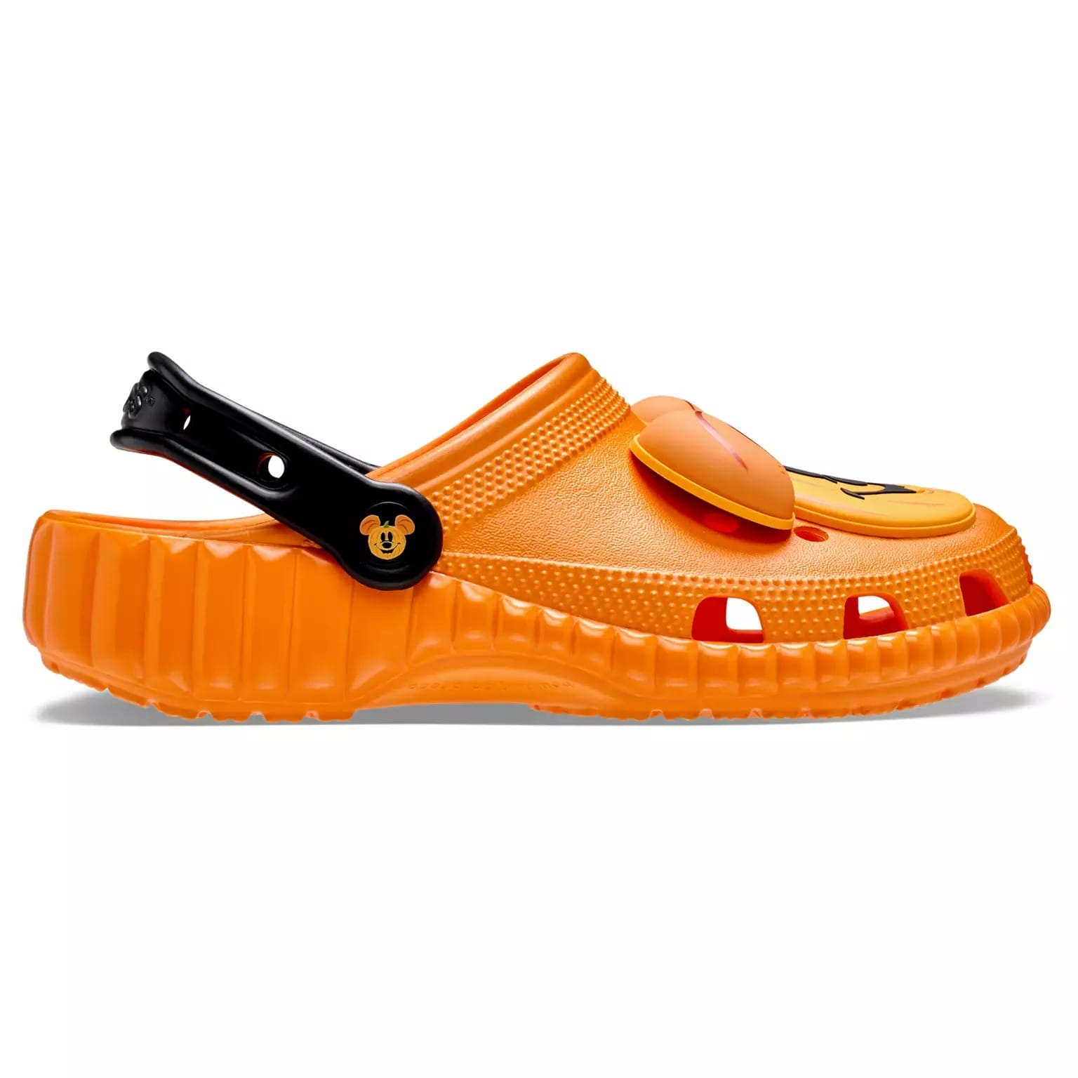 Bright orange clog with a black heel strap and Mickey ears, part of the new Disney merchandise for Halloween.
