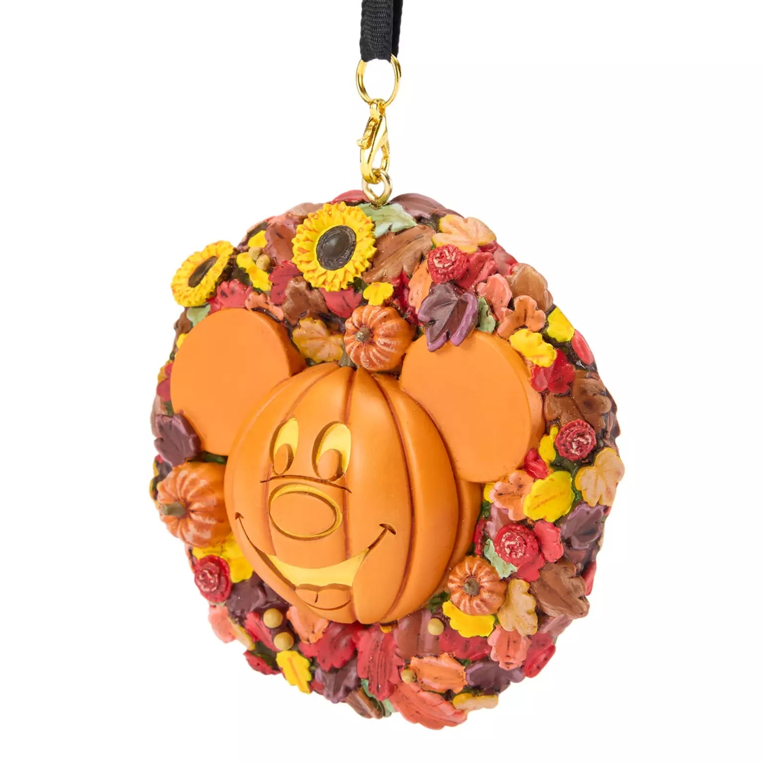 Mickey Mouse pumpkin face on a fall wreath ornament, part of Disney Store's Halloween merchandise, with leaves and pumpkins.