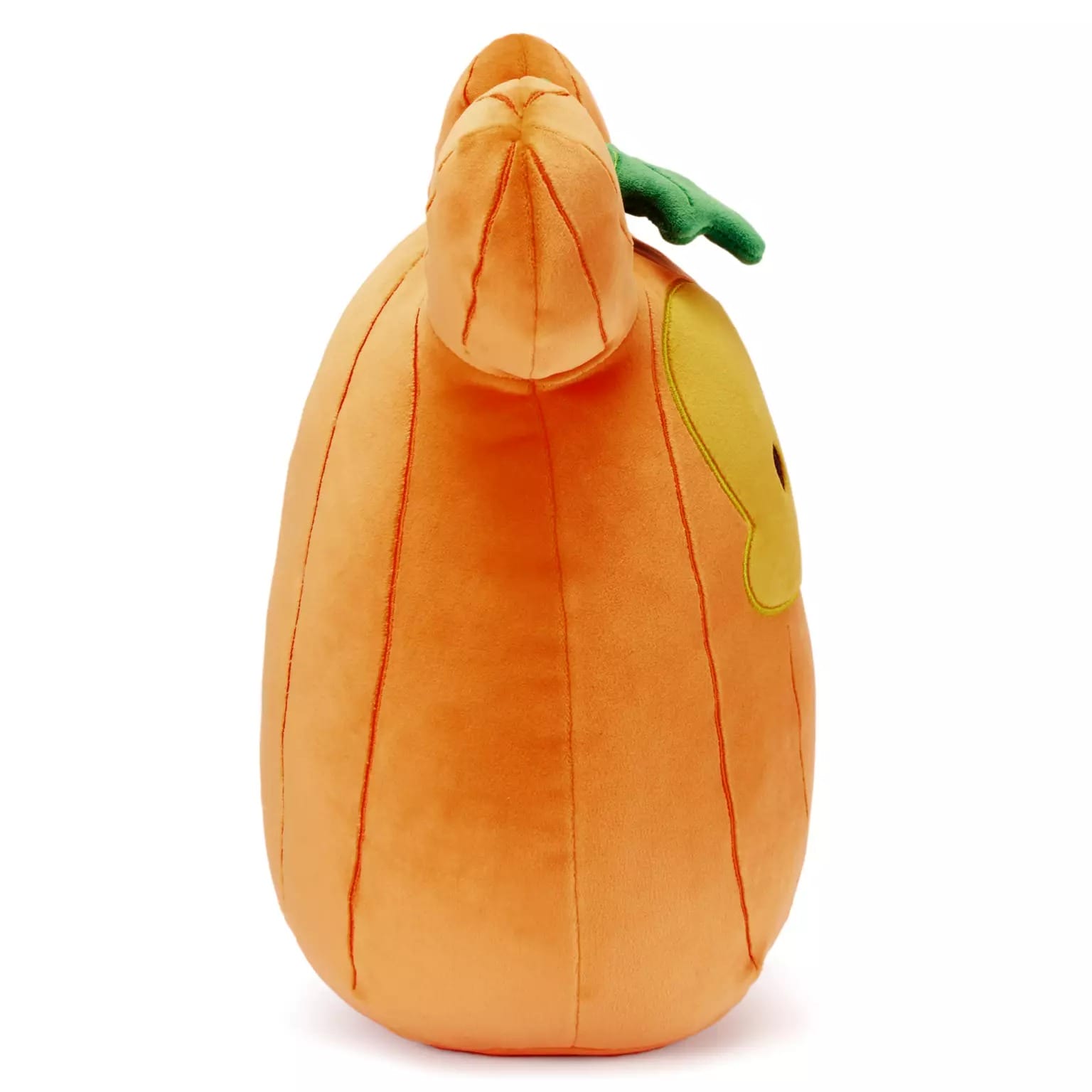 Plush pumpkin toy with a green leaf, part of Disney Store Halloween merchandise, viewed from the side on white.