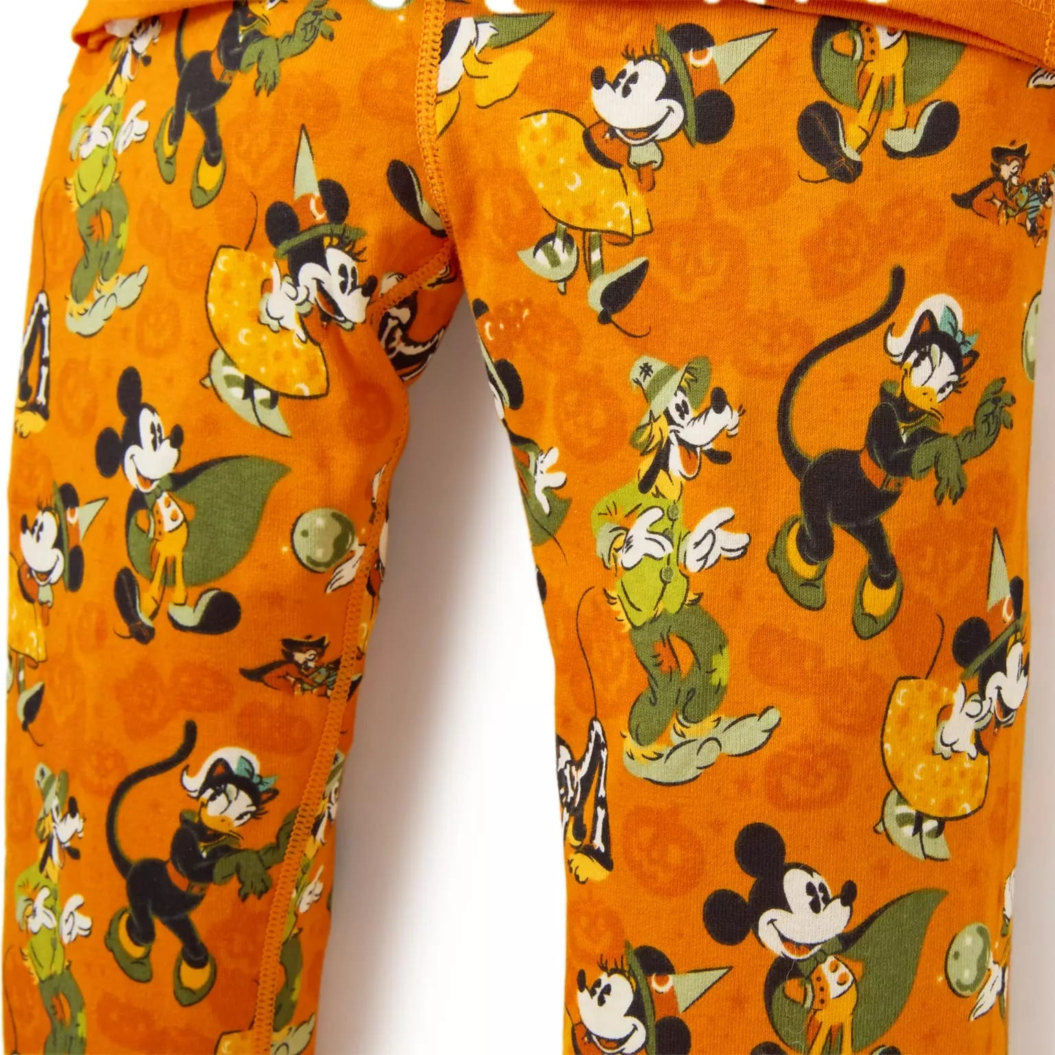 Orange pajama pants with a Halloween-themed Mickey Mouse print, part of new Disney Store Halloween merchandise.