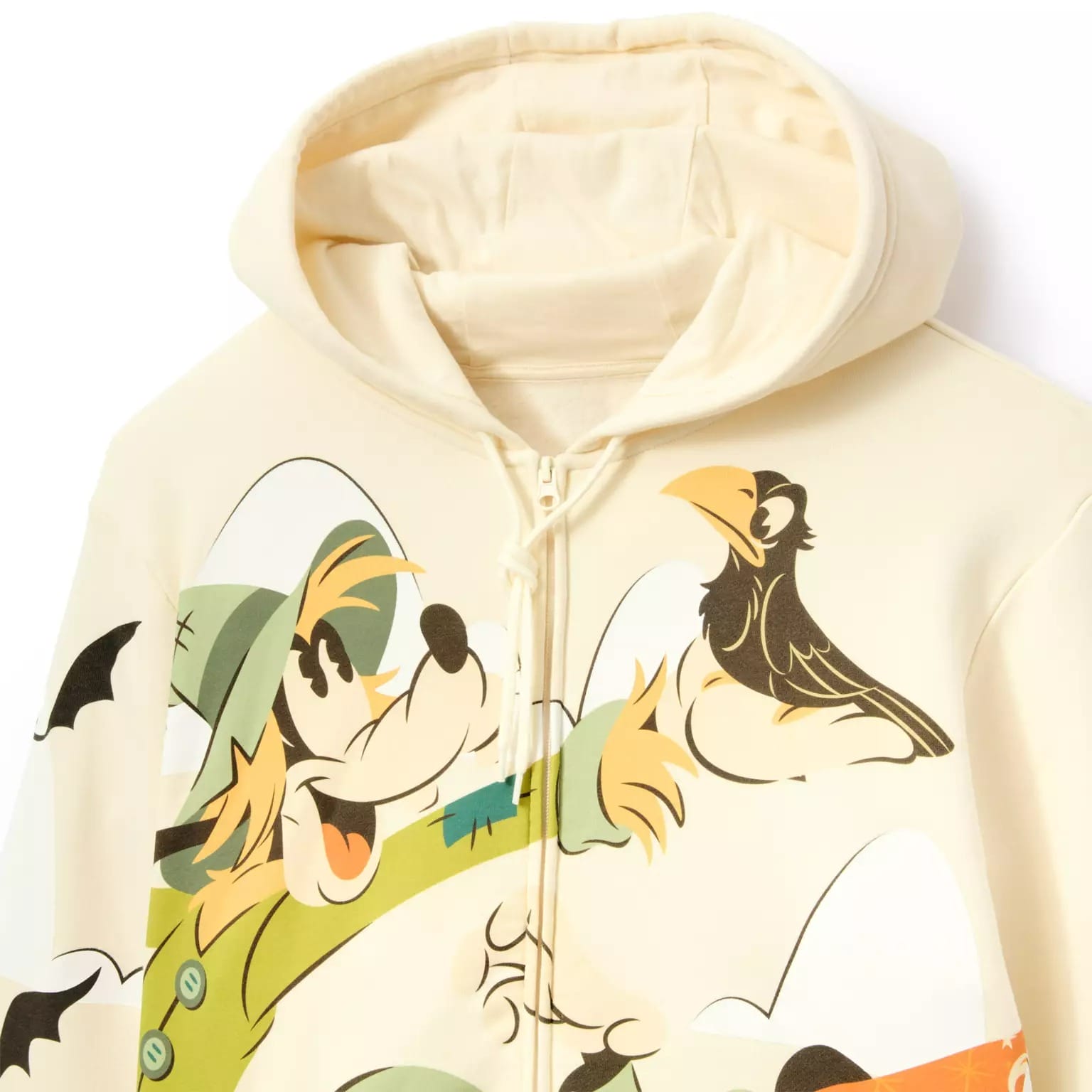 Cream hoodie with a cartoon Goofy in a green outfit and a black bird, inspired by Halloween merchandise.