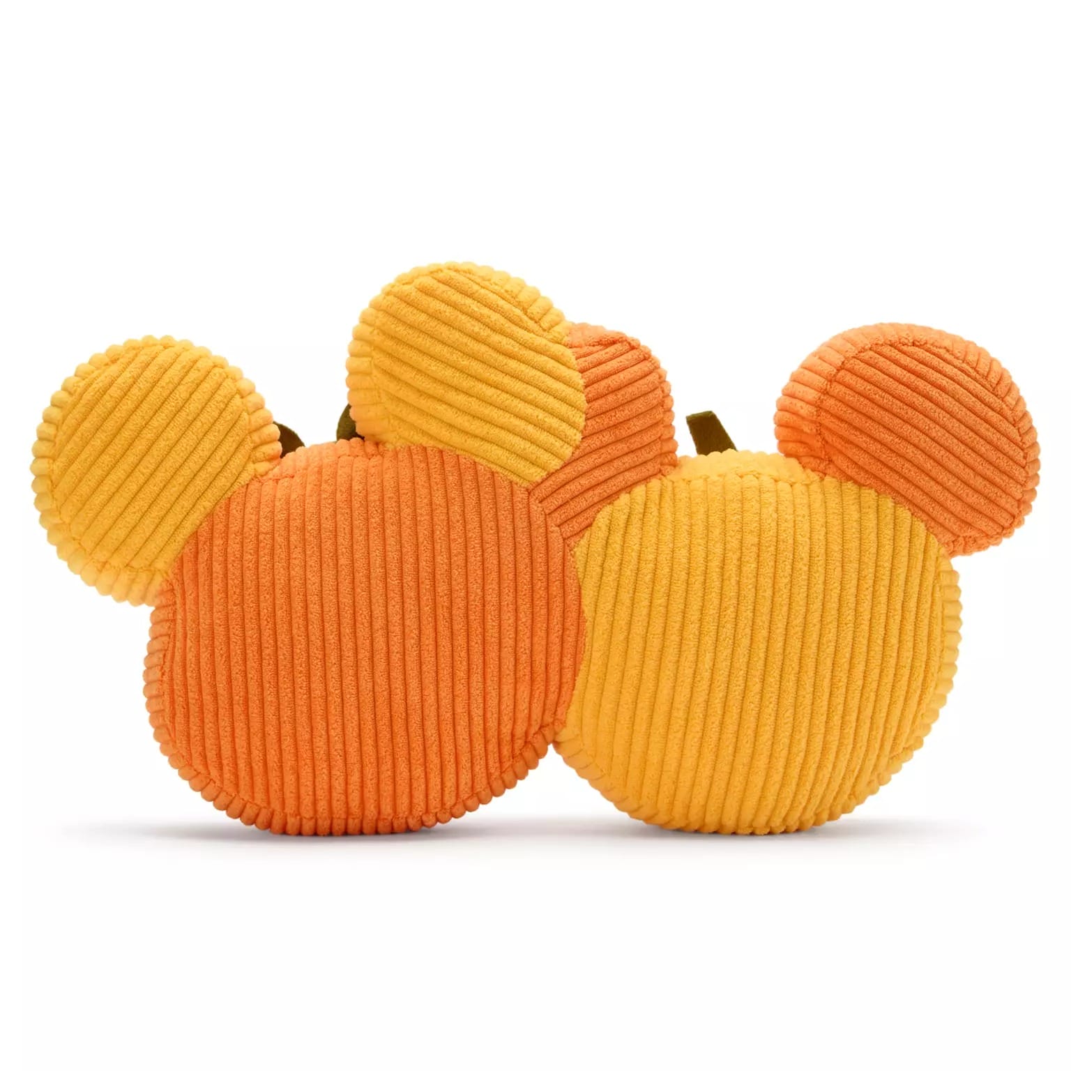 Two plush bear head pillows—one orange, one yellow—feature ribbed corduroy, part of new Disney Store Halloween merchandise.