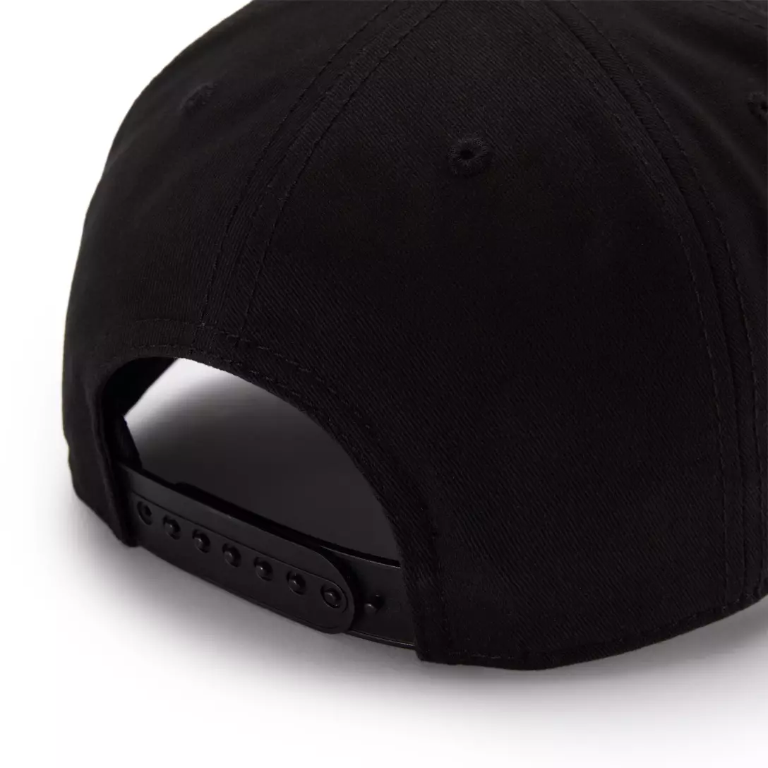 Close-up of the back of a black Fantastic Four baseball cap with an adjustable snapback strap.