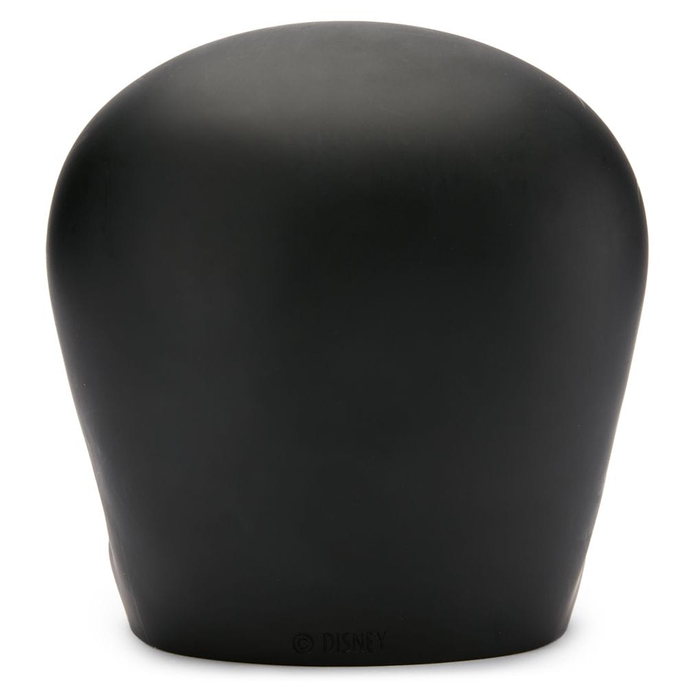 A smooth, matte black object with a rounded top, evoking the minimalist spirit of the Haunted Mansion Collection.