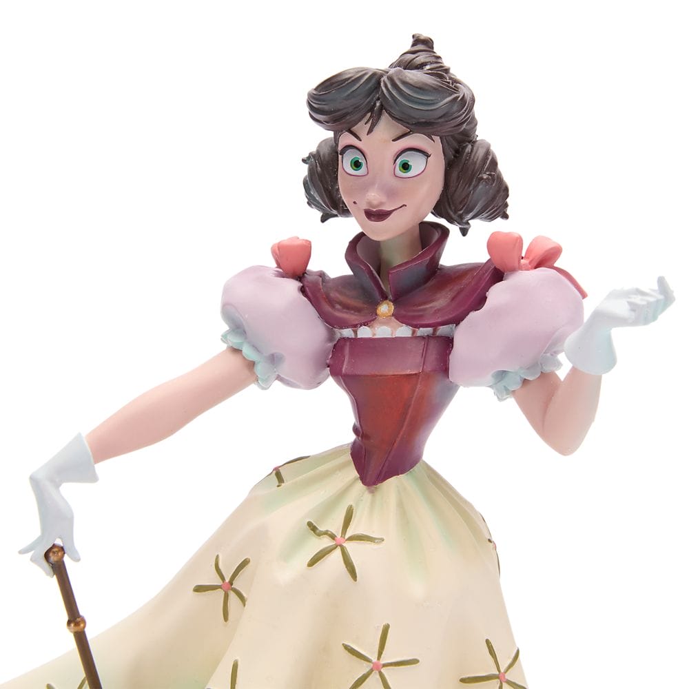 A figurine of a woman in a Victorian-style dress, part of the Haunted Mansion Collection at the Disney Store.