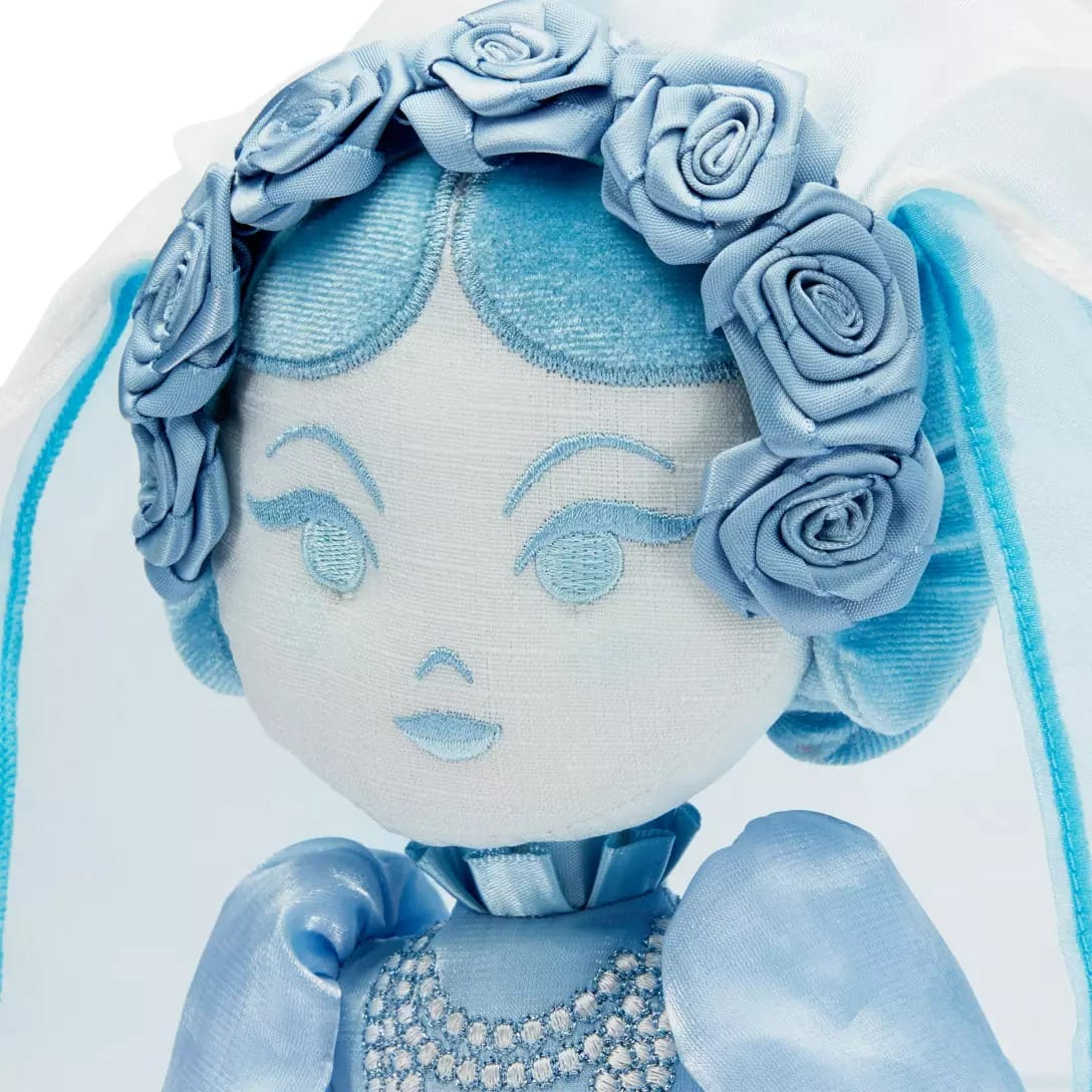 A fabric doll with blue hair, floral crown, dress, and sheer veil from the Haunted Mansion Collection.
