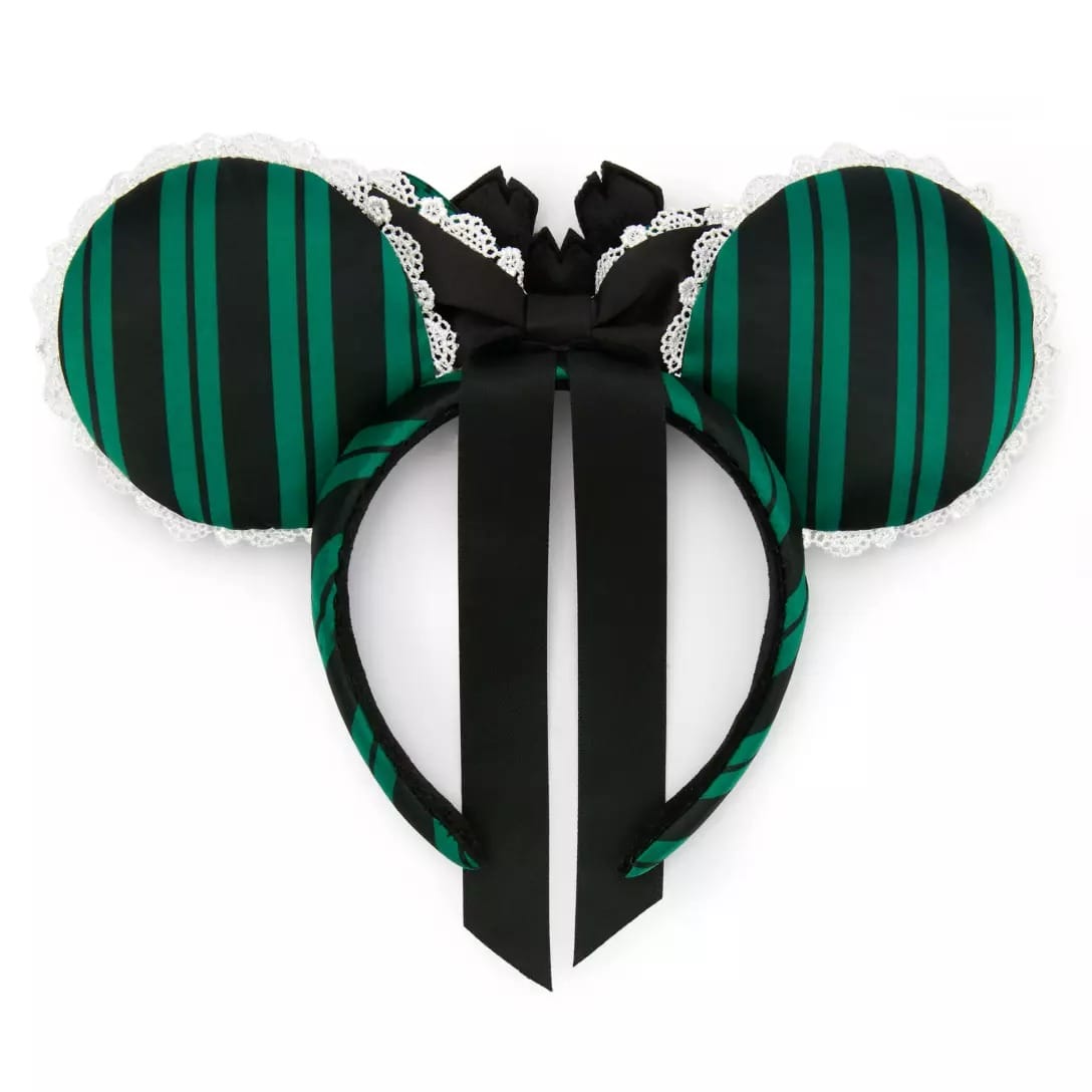 Green and black striped Minnie Mouse ears from the Haunted Mansion Collection with black bow and white lace trim.