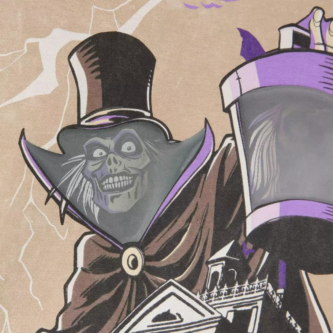 A creepy, grinning skeleton in a top hat and cloak from the Haunted Mansion Collection holds a lantern with a ghostly face.