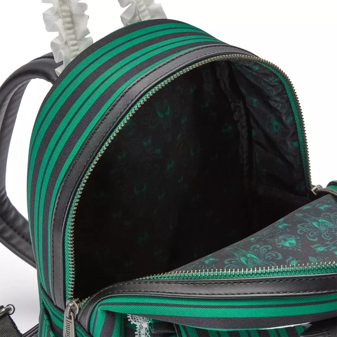 A green and black striped backpack from Disney Store, with its main compartment open, revealing Haunted Mansion lining.