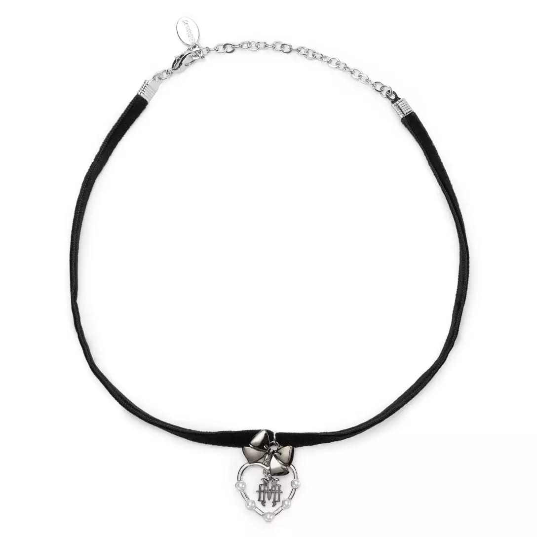 Black velvet choker from the Haunted Mansion Collection with silver bow and heart-shaped "HTH" monogram pendant.