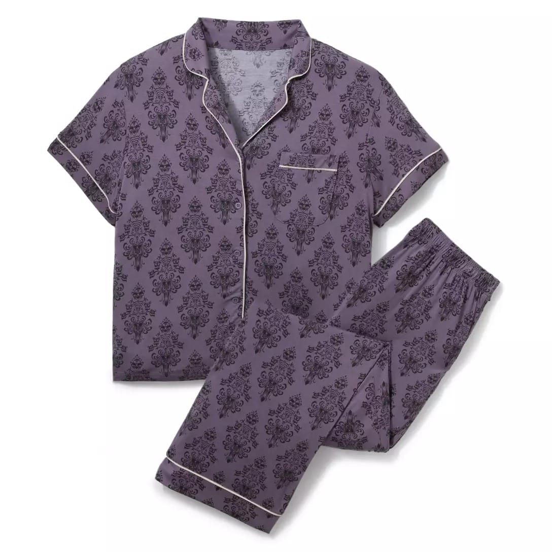 Short-sleeved, button-up purple pajama set inspired by Disney Store's Haunted Mansion damask pattern and light piping.