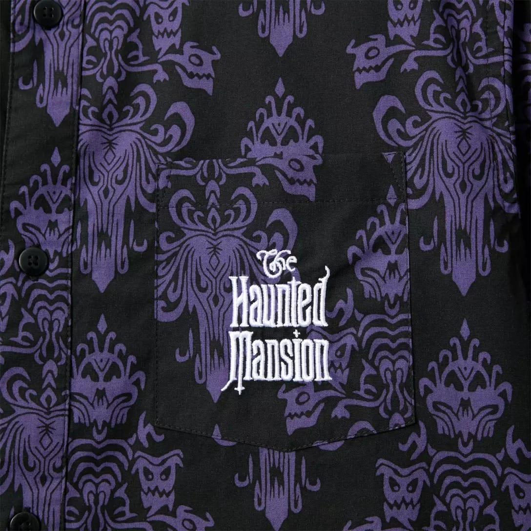 A shirt pocket with a purple gothic pattern and "The Haunted Mansion" embroidery from the Haunted Mansion Collection.
