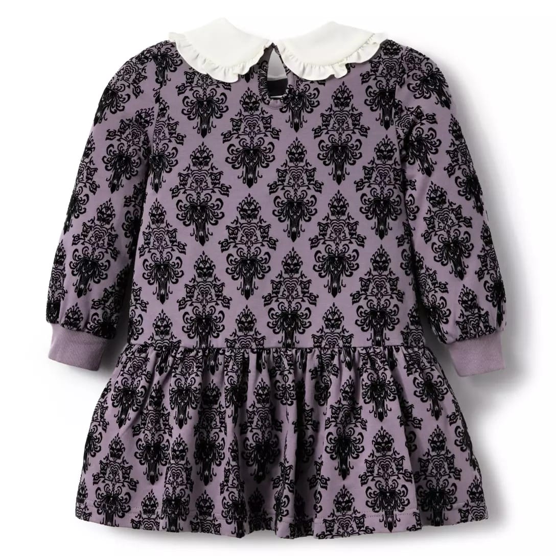 Long-sleeve purple dress with black damask, white Peter Pan collar, from the Haunted Mansion Collection, back view.