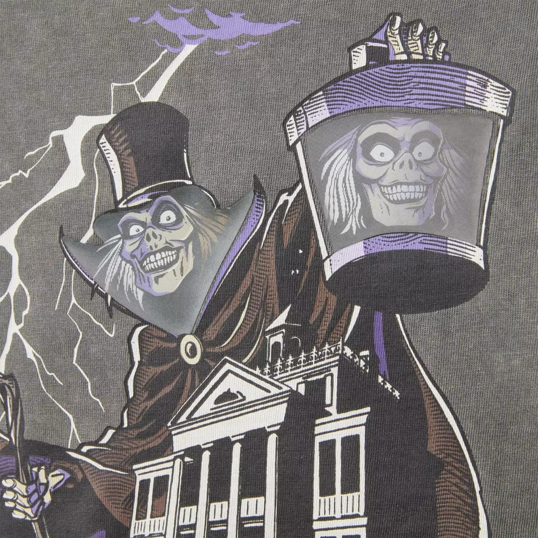 A cartoon skeleton in a top hat holds a ghostly bucket, posing by a Haunted Mansion from the Haunted Mansion Collection.