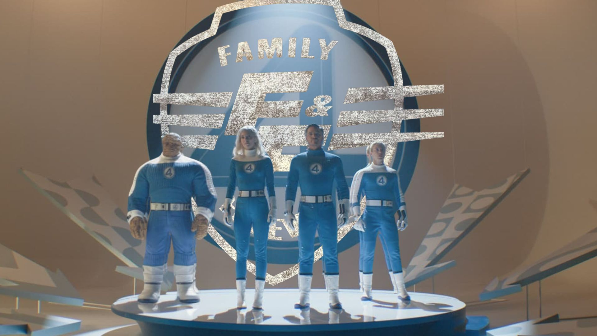 Four superheroes in blue suits, like the Fantastic Four, stand before a large "Family" sign with wings and an "F &" symbol.