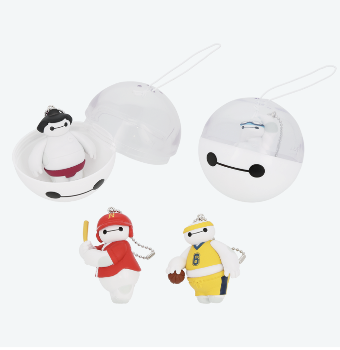 Four Baymax Capsule Toys from Tokyo Disney Resort: capsule, swim trunks, batter, and a yellow basketball uniform.