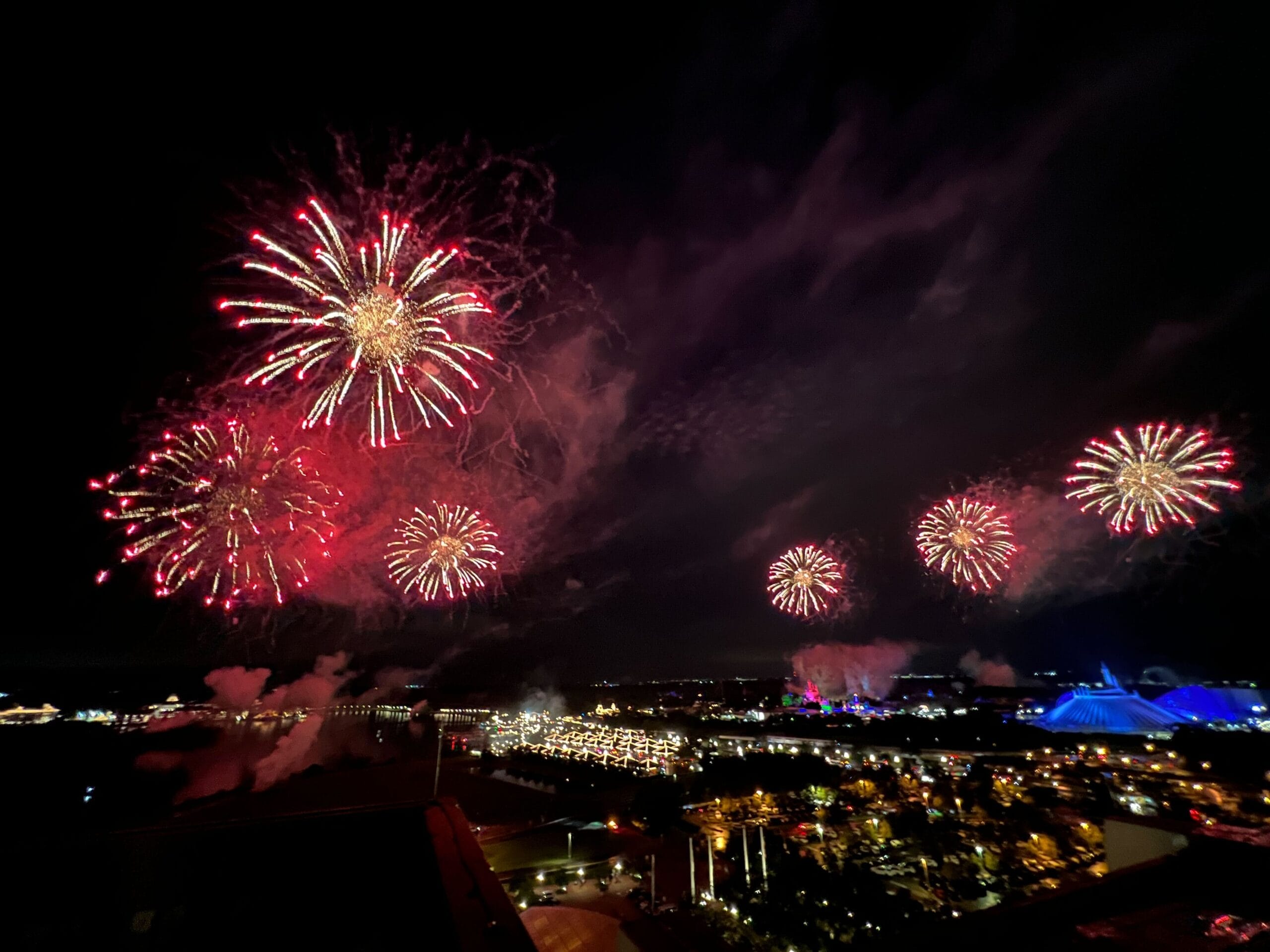 Red and gold fireworks light up the night sky as the city celebrates America on the Fourth of July 2025.