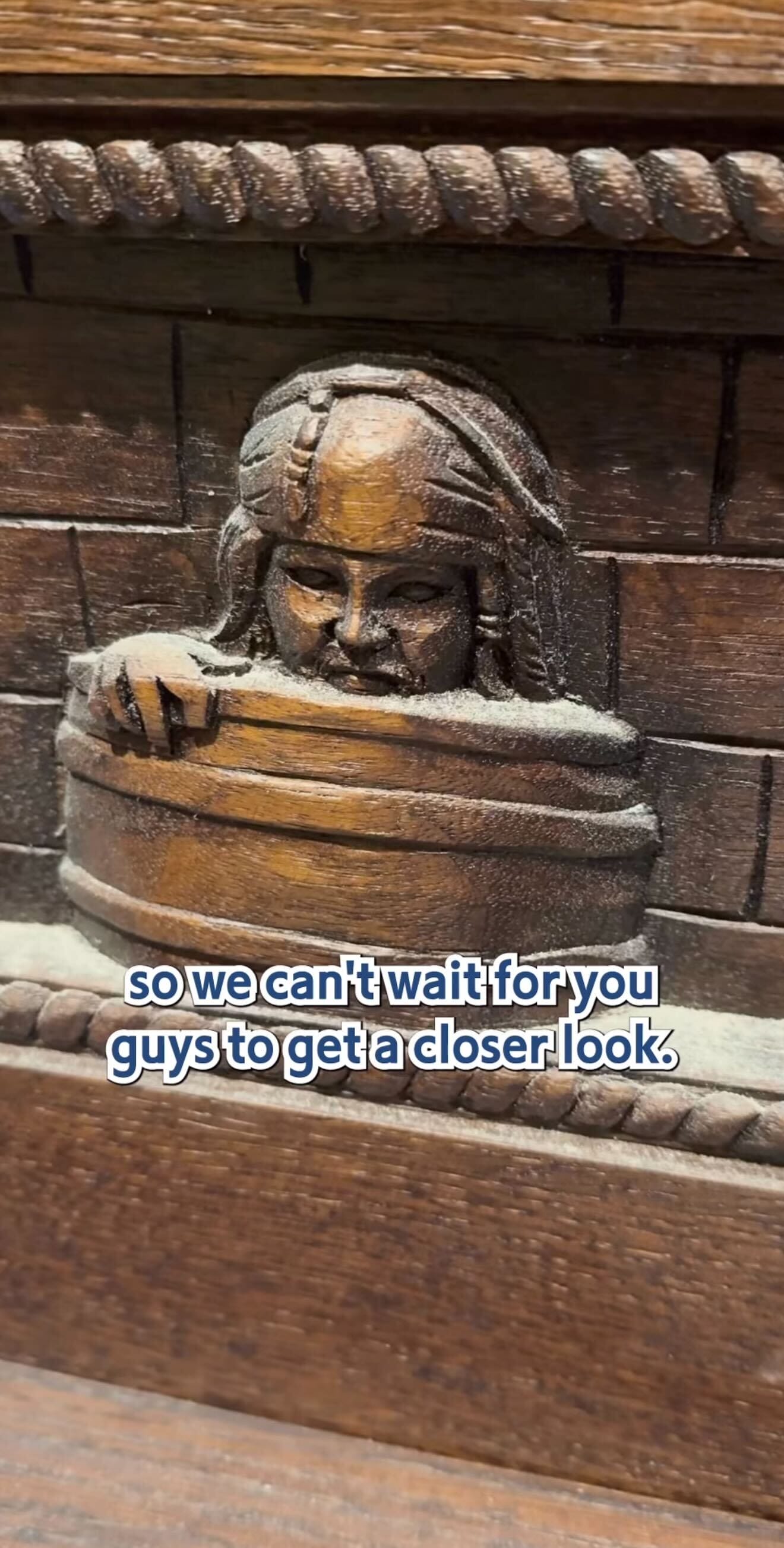 Wooden carving at The Beak and Barrel, a pirates tavern in Magic Kingdom, peeking over a ledge—can’t wait for your closer look!