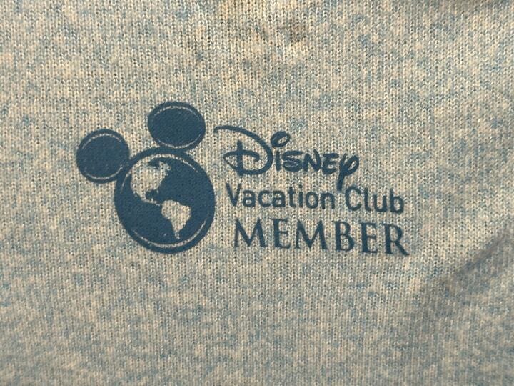 Disney Vacation Club Member logo on gray fabric, perfect for Resort Apparel or an Old Key West T-Shirt.