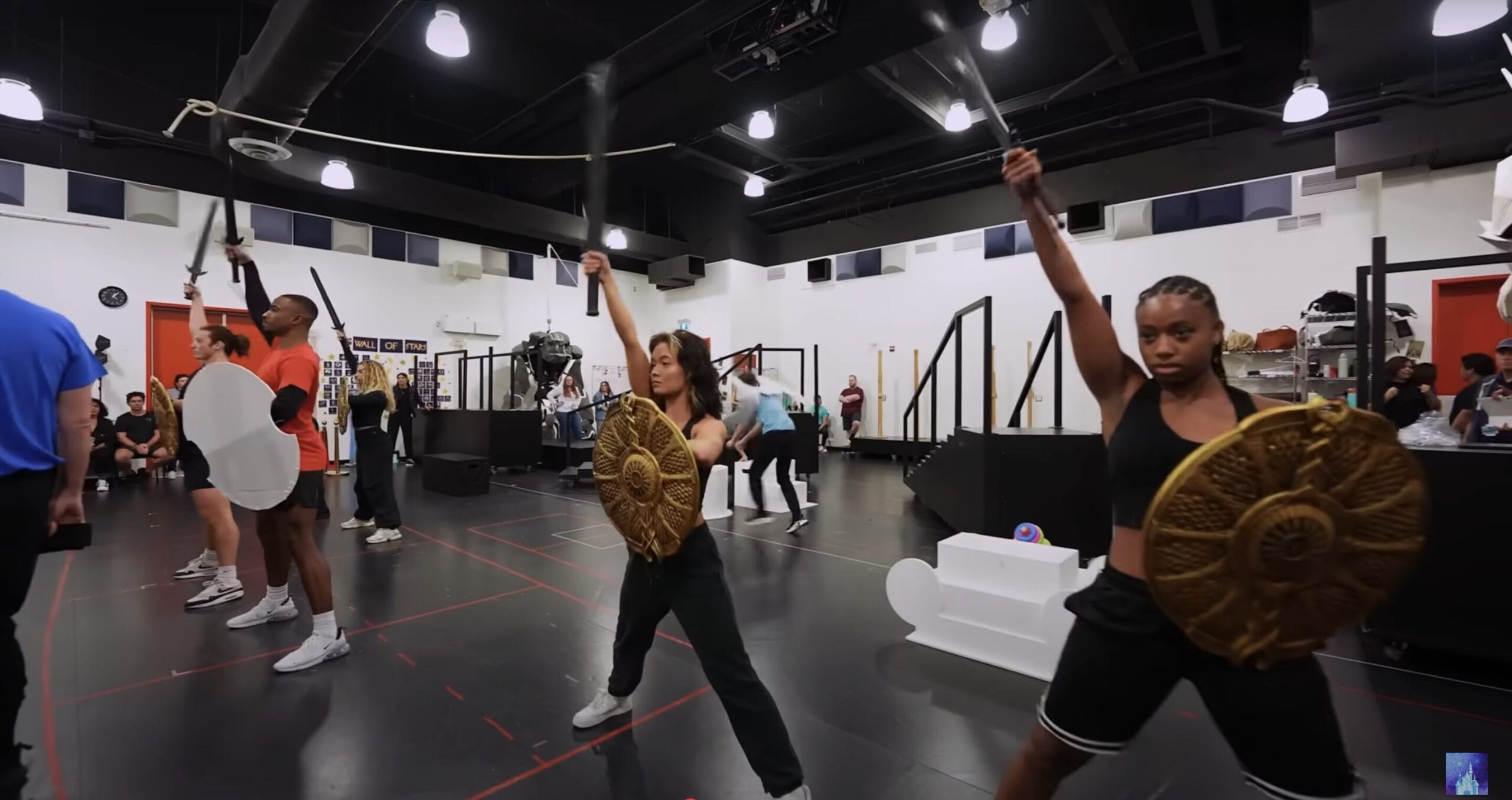 Performers rehearse choreography with swords and shields for the Hercules Stage Show on Disney Cruise Line.