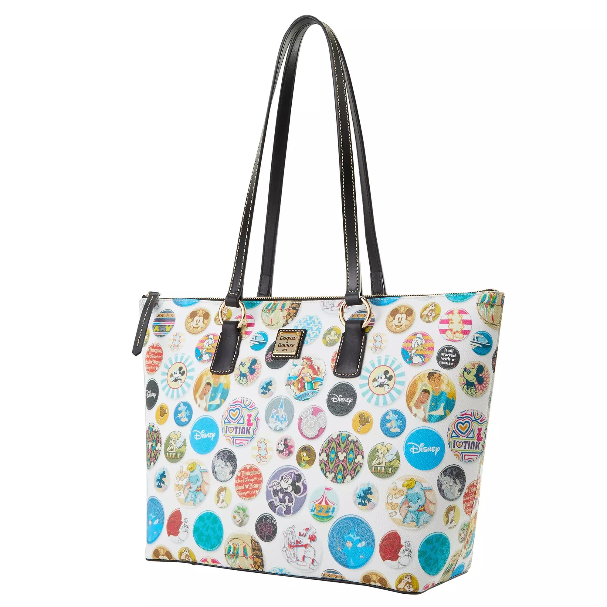 White tote bag with black handles, adorned with colorful Disney Buttons and logo circles all over.