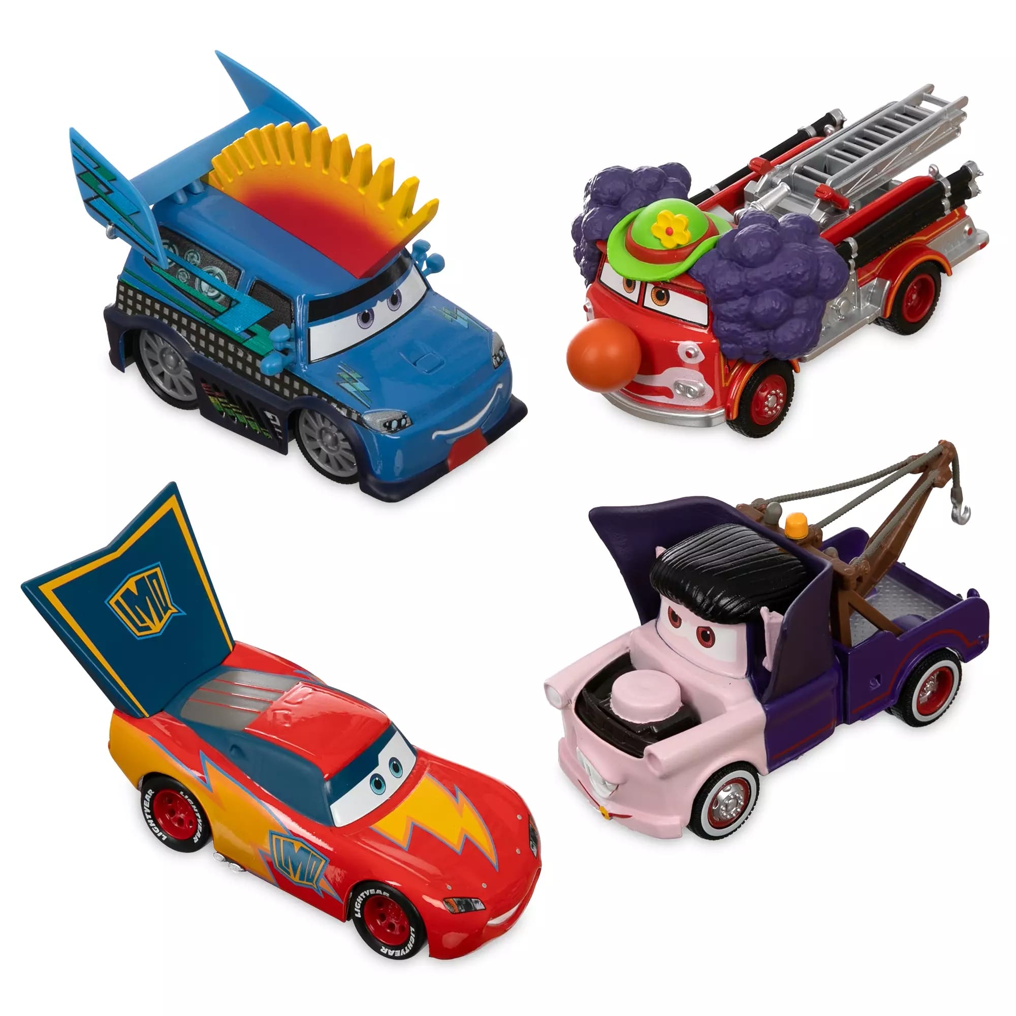 Four Disney Store Cars Halloween Die Cast Figures dressed in whimsical circus costumes, arranged in a colorful grid.
