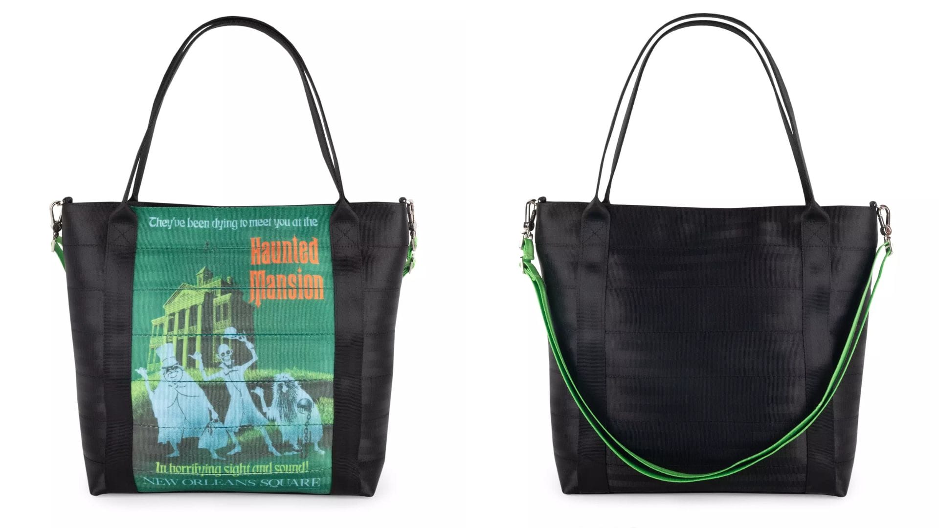 A black tote bag with a Haunted Mansion graphic on the front and a green shoulder strap, shown front and back.