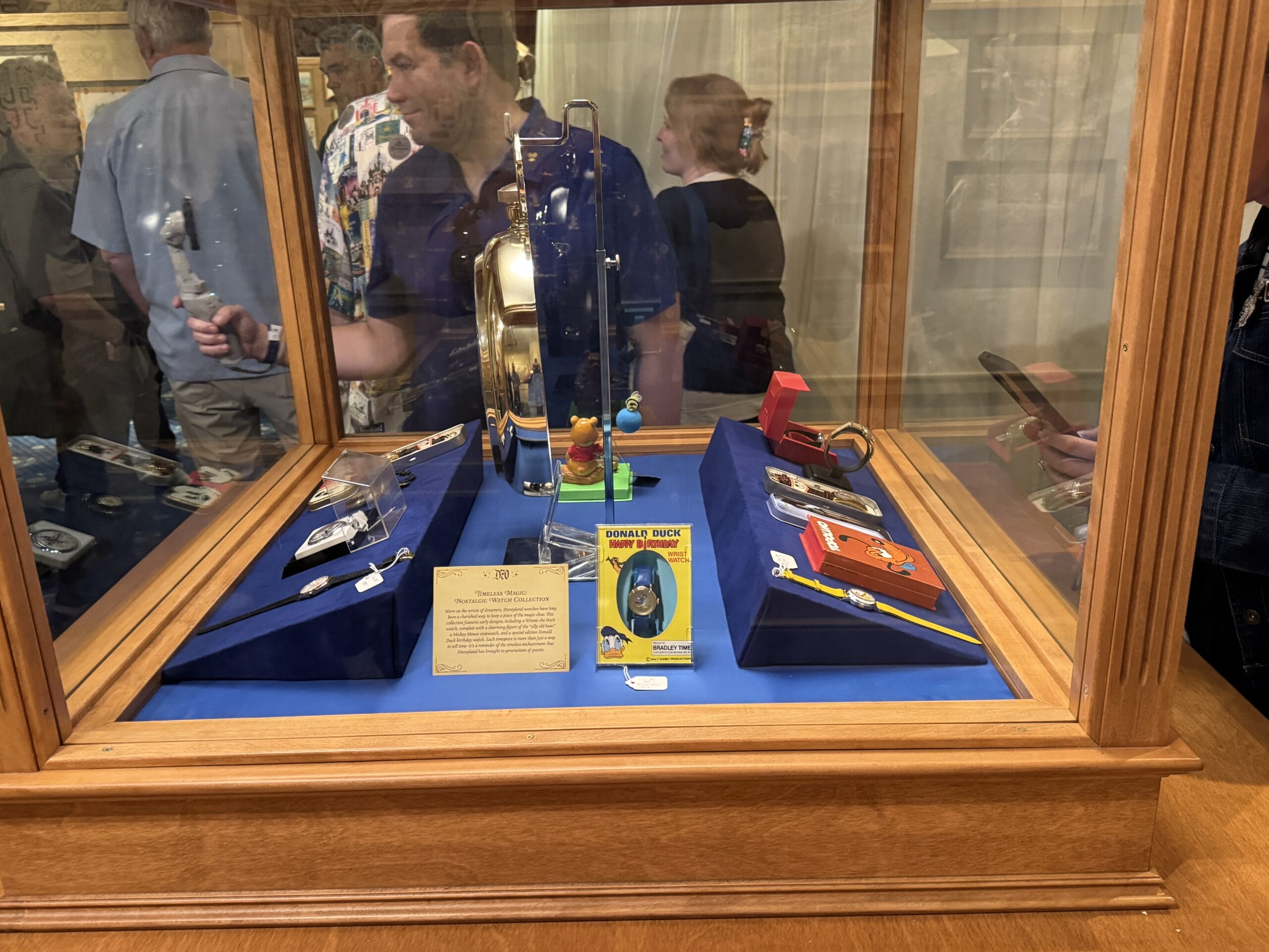 A display case with vintage toy gadgets and an info card, featured in the Main Street Opera House’s new exhibits.