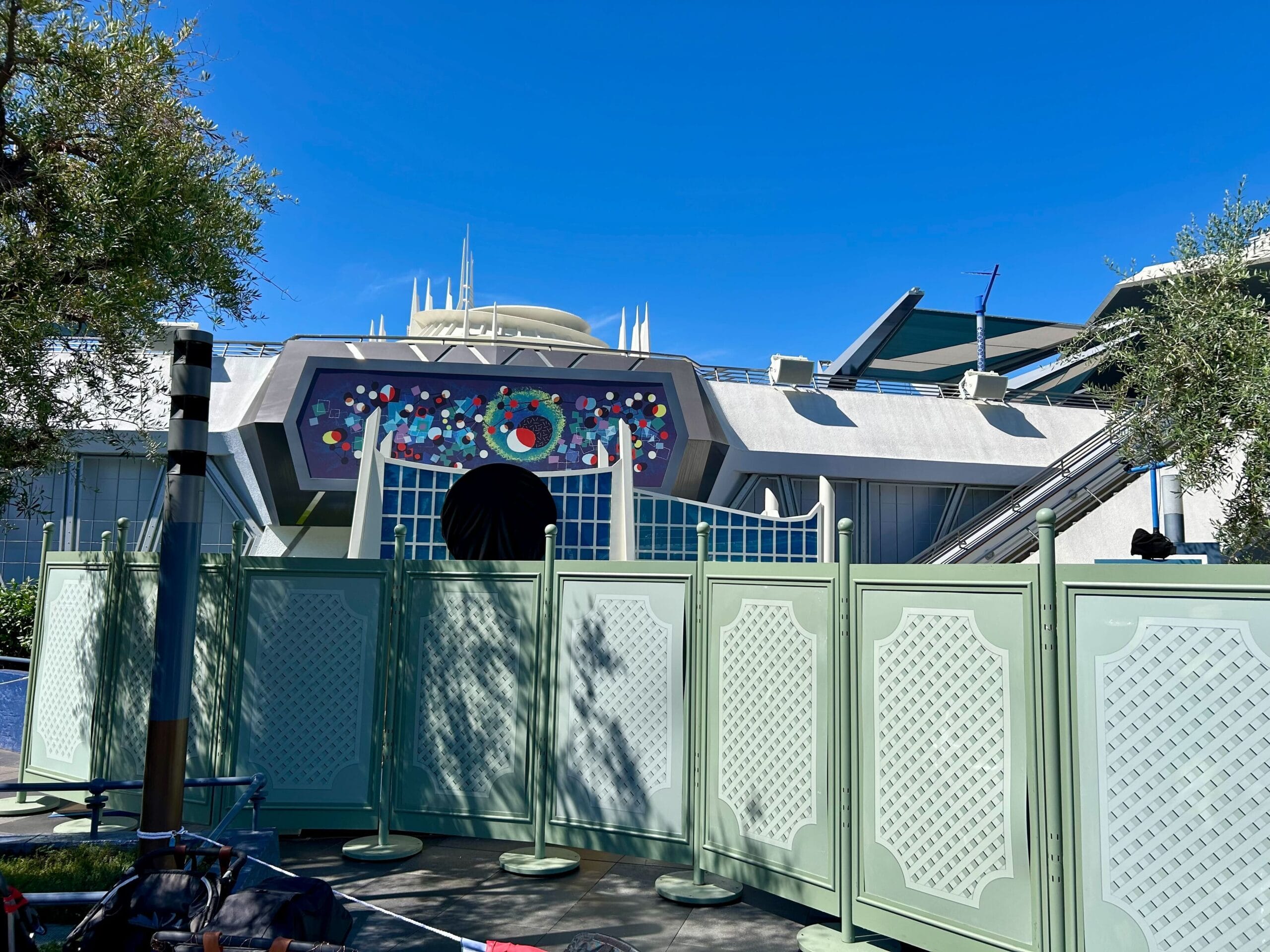 Pale green construction walls block the entrance to a Fantastic Four meet and greet at Disneyland Park.