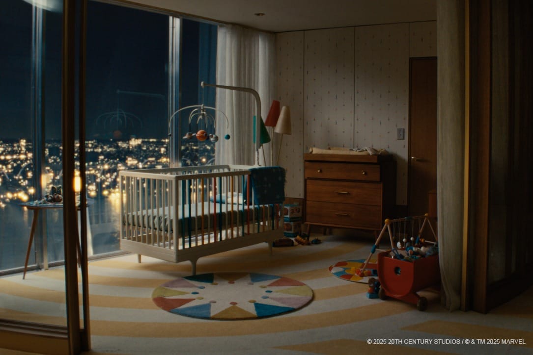 A mid-century nursery at night with a crib, dresser, toys, and a large window overlooking a city with bright lights.