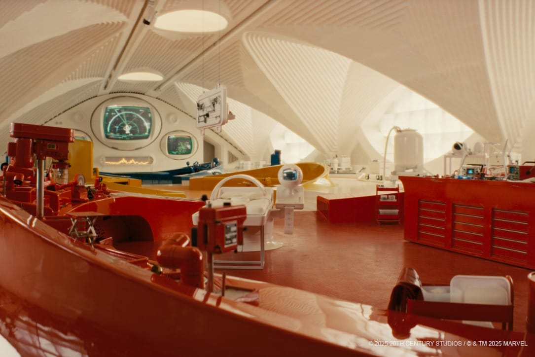 Retro-futuristic, white-domed work area with red workstations, screens, and advanced equipment, inspired by retro sci-fi design.