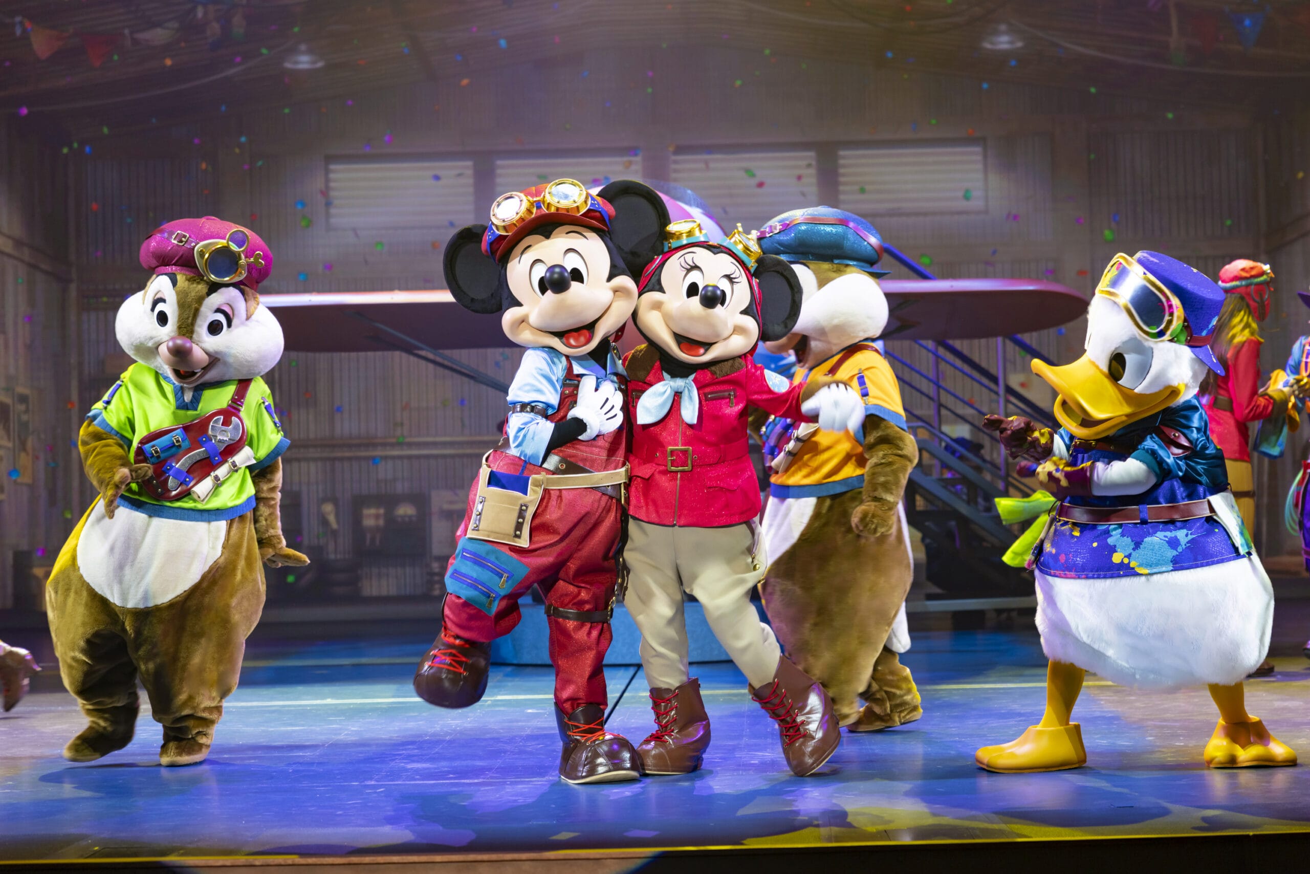 Mickey and Minnie Mouse in aviator outfits at Tokyo DisneySea as dreams take flight with Chip, Dale, and Donald Duck.