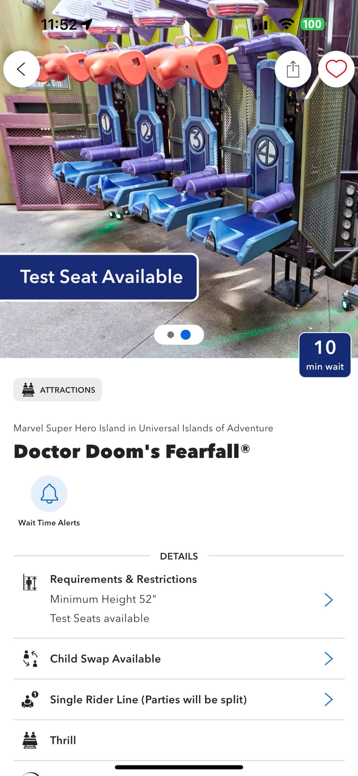 Test seats for Doctor Doom's Fearfall ride at Universal, with a sign indicating "Test Seat Available" and a 10-minute wait.